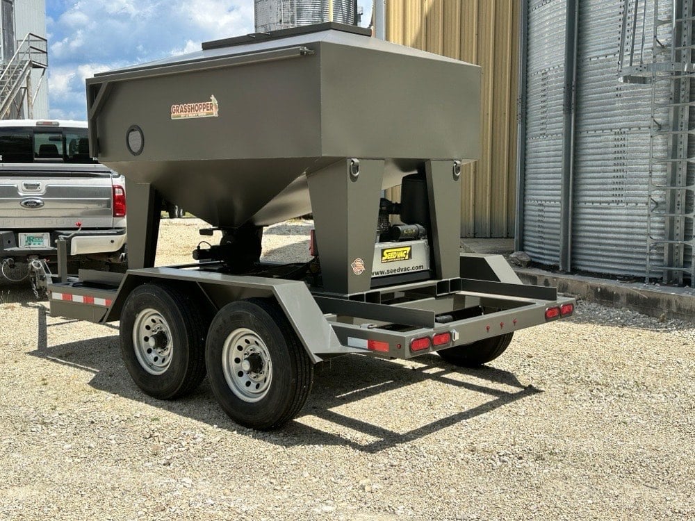 Rear view of the Grasshopper 130 hopper unit showing the seed vac and delivery hardware
